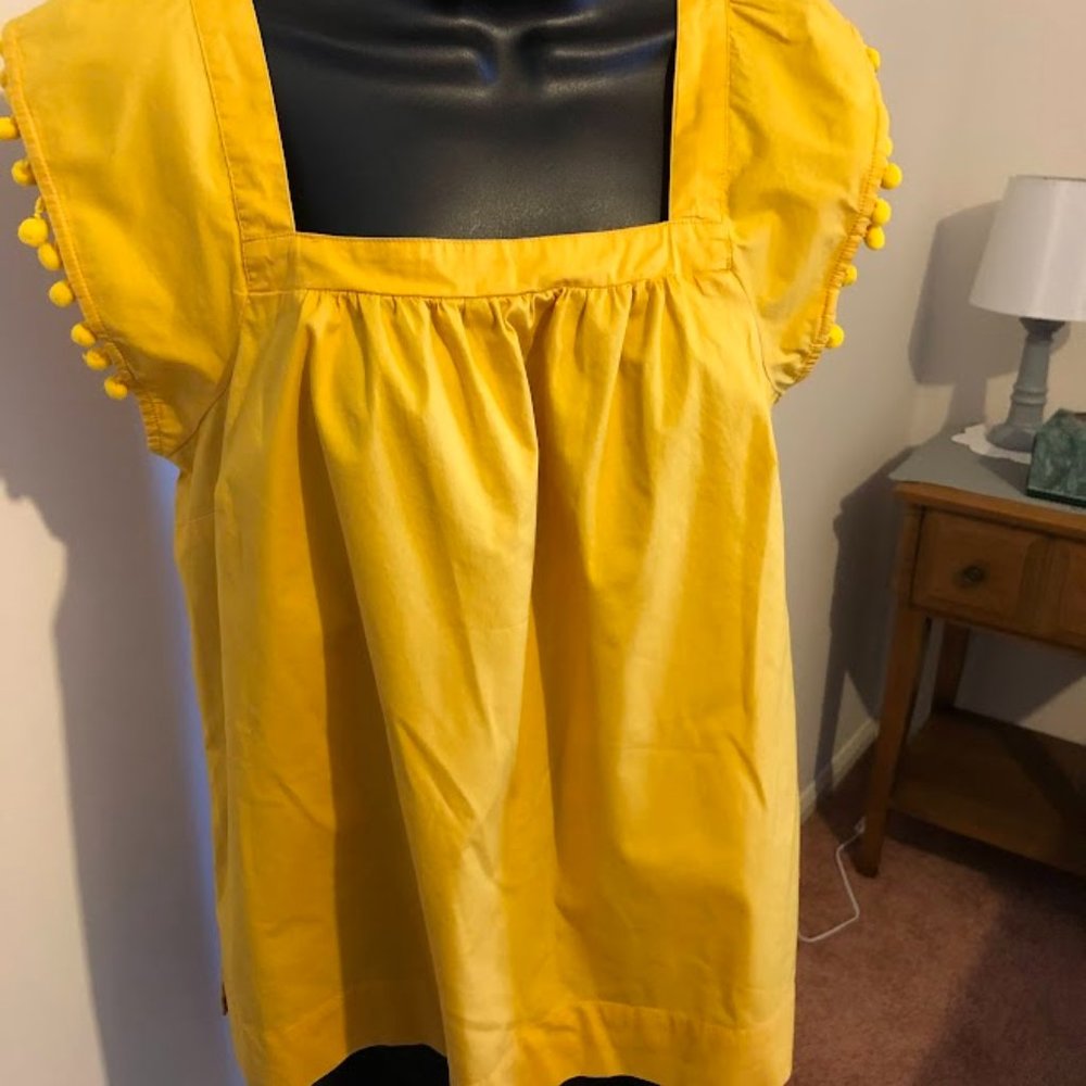 Women's yellow sleeveless top